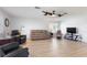 Spacious living room with neutral walls, hardwood floors, and comfortable seating at 7402 9Th W Ave, Bradenton, FL 34209