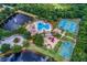 Aerial view of community amenities including pool, tennis, and basketball courts at 11916 Persian Ter, Bradenton, FL 34212