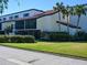 Exterior view of building showcasing landscaping and architecture at 2055 Gulf Of Mexico Dr # G2-102, Longboat Key, FL 34228