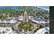 Aerial view of St. Armands Circle, showing a circular park surrounded by commercial buildings and busy streets at 2141 Clematis St, Sarasota, FL 34239