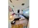 Cozy bedroom with wood floors, carpet rug, and a comfortable bed setup at 2141 Clematis St, Sarasota, FL 34239