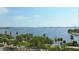 Scenic waterfront view with boats, palm trees, and city skyline in the distance at 2141 Clematis St, Sarasota, FL 34239