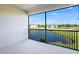 Screened balcony overlooking a pond and landscape at 23445 Collina Way # 10202, Port Charlotte, FL 33980