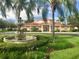 Community clubhouse with fountain at 2950 Viscaya Pl # 108, Sarasota, FL 34237