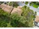 Aerial view of a townhouse community showing building rooftops and surrounding landscape at 3415 51St Avenue W Cir # 206, Bradenton, FL 34210