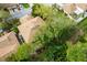 Aerial view of a townhouse with brown roof and a surrounding landscape at 3415 51St Avenue W Cir # 206, Bradenton, FL 34210