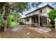 Backyard patio with screened-in porch, perfect for outdoor dining and entertaining at 3415 51St Avenue W Cir # 206, Bradenton, FL 34210