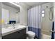 Clean bathroom with shower/tub combo, vanity, and toilet at 3415 51St Avenue W Cir # 206, Bradenton, FL 34210