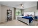 Main bedroom with king-size bed and stylish decor at 3415 51St Avenue W Cir # 206, Bradenton, FL 34210