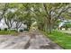 Attractive community entrance lined with lush trees and landscaping at 3415 51St Avenue W Cir # 206, Bradenton, FL 34210
