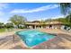 Sparkling community pool with ample lounge seating for residents to enjoy the outdoors at 3415 51St Avenue W Cir # 206, Bradenton, FL 34210