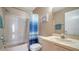 Clean bathroom with shower/tub combo, vanity, and updated fixtures at 3609 59Th W Ave # 4045, Bradenton, FL 34210