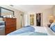 Bedroom includes a full bed, dresser, and an ensuite bathroom at 3609 59Th W Ave # 4045, Bradenton, FL 34210