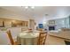 Bright dining area with adjacent kitchen and living room at 3609 59Th W Ave # 4045, Bradenton, FL 34210