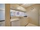 Kitchen boasts double sink, dishwasher, and pass-through to dining area at 3609 59Th W Ave # 4045, Bradenton, FL 34210