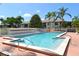 Refreshing community pool with spa and lounge chairs at 3609 59Th W Ave # 4045, Bradenton, FL 34210
