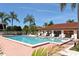 Community pool with lounge chairs and covered seating at 3609 59Th W Ave # 4045, Bradenton, FL 34210