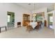 Bright dining room with access to bedroom and backyard at 4501 Peridia E Blvd, Bradenton, FL 34203