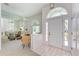 Bright and airy entryway with a large mirror and seating area at 4501 Peridia E Blvd, Bradenton, FL 34203