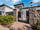 Stone pillars with iron gate leading to front entrance at 4625 Trento Pl, Bradenton, FL 34211