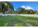 Large backyard with lush lawn and privacy fence at 5315 24Th St W, Bradenton, FL 34207