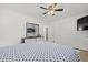 Spacious bedroom with a queen bed, dresser, and large closet at 5315 24Th St W, Bradenton, FL 34207