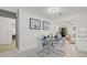 Elegant dining area with a marble table and seating for four at 5315 24Th St W, Bradenton, FL 34207