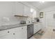 Modern kitchen with white cabinets and granite countertops at 5315 24Th St W, Bradenton, FL 34207