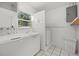 Laundry Room with washer, dryer, and utility sink at 5315 24Th St W, Bradenton, FL 34207