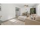 Bright sunroom with comfortable seating and access to the outdoors at 5315 24Th St W, Bradenton, FL 34207