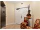 Condo entryway with elevator access and seating area at 6340 Watercrest Way # 202, Lakewood Ranch, FL 34202