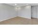 Spacious bedroom with neutral walls and tile floors at 6415 Coliseum Blvd, Port Charlotte, FL 33981