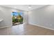 Dining area with sliding glass doors leading to the backyard at 6415 Coliseum Blvd, Port Charlotte, FL 33981