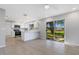 Modern kitchen with stainless steel appliances and white cabinetry at 6415 Coliseum Blvd, Port Charlotte, FL 33981