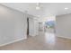 Spacious living room with tile floors and lots of natural light at 6415 Coliseum Blvd, Port Charlotte, FL 33981