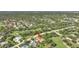 Aerial view of single-Gathering home on golf course lot at 7003 River Club Blvd, Bradenton, FL 34202