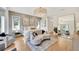 Spacious primary bedroom with hardwood floors and sitting area at 7003 River Club Blvd, Bradenton, FL 34202