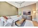 Relaxing Gathering room with sectional sofa, large screen TV, and modern decor at 7003 River Club Blvd, Bradenton, FL 34202