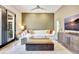 Bright Gathering room features a comfy sectional sofa, large TV, and stylish coffee table at 7003 River Club Blvd, Bradenton, FL 34202