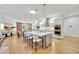 Modern kitchen with double islands, stainless steel appliances, and white shaker cabinets at 7003 River Club Blvd, Bradenton, FL 34202