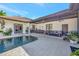 Enjoy this luxurious pool and patio area, complete with covered seating at 7003 River Club Blvd, Bradenton, FL 34202