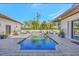Inviting pool area with lounge chairs, umbrellas, and a spacious patio at 7003 River Club Blvd, Bradenton, FL 34202