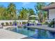 Relaxing pool area with plenty of space for sunbathing and entertaining at 7003 River Club Blvd, Bradenton, FL 34202