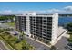 Aerial view of condo building showcasing waterfront location at 7100 Sunshine Skyway S Ln # 706, St Petersburg, FL 33711
