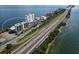 Aerial view showing condo building near highway and waterfront at 7100 Sunshine Skyway S Ln # 706, St Petersburg, FL 33711