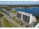 Aerial view of condo building near waterfront and highway at 7100 Sunshine Skyway S Ln # 706, St Petersburg, FL 33711