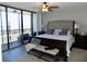 Spacious bedroom with a king-size bed and balcony access at 7100 Sunshine Skyway S Ln # 706, St Petersburg, FL 33711