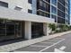 Condo building main entrance with glass doors and tile flooring at 7100 Sunshine Skyway S Ln # 706, St Petersburg, FL 33711