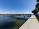 Wooden pier extending over the calm water at 7100 Sunshine Skyway S Ln # 706, St Petersburg, FL 33711