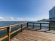 Wooden dock extending over the water, offering scenic waterfront views at 7100 Sunshine Skyway S Ln # 706, St Petersburg, FL 33711